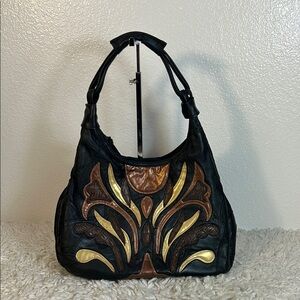 Elegant Black and Gold Hobo Bag with Artistic Flair